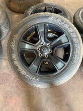 Load image into Gallery viewer, Set of Used Black '19-'25 Dodge RAM 1500 OEM Wheels on 275/55R20 Bridgestone LT