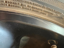 Load image into Gallery viewer, Set of Used Black '19-'25 Dodge RAM 1500 OEM Wheels on 275/55R20 Bridgestone LT