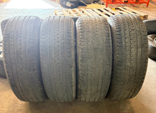 Load image into Gallery viewer, Set of Used Black '19-'25 Dodge RAM 1500 OEM Wheels on 275/55R20 Bridgestone LT