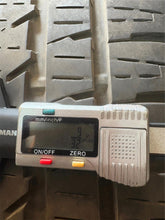 Load image into Gallery viewer, Set of Used Black '19-'25 Dodge RAM 1500 OEM Wheels on 275/55R20 Bridgestone LT