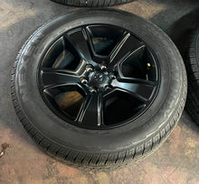 Load image into Gallery viewer, Set of Four Used OEM 20" Black '19-'24 RAM 1500 Rims on 275/55R20 Nexen Tires LT