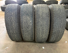 Load image into Gallery viewer, Set of 4 Used '11-'25 GMC 2500 Denali Ultimate Q7H Wheels 275/65R20 Goodyear LT
