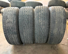 Load image into Gallery viewer, Set of Used 20" '19-'25 Dodge RAM 1500 2675 Rims 275/55R20 Falken Wildpeak AT LT