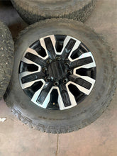 Load image into Gallery viewer, Set of 4 Used '11-'25 GMC 2500 Denali Ultimate Q7F Wheels 275/65R20 Goodyear LT