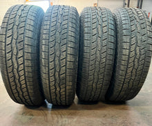 Load image into Gallery viewer, Set of Four OEM '24-'25 Toyota Tacoma TRD Wheels on 265/70R17 Falken Wildpeak LT