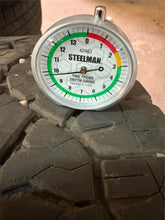 Load image into Gallery viewer, Set of 4 Used '11-'25 GMC 2500 Denali Ultimate Q7F Wheels 275/65R20 Goodyear LT