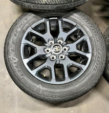 Load image into Gallery viewer, Set of 20" Dark Charcoal '22-'25 Toyota Tundra Wheels 265/60R20 Bridgestone H/T