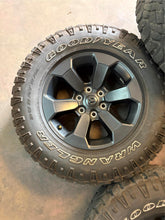 Load image into Gallery viewer, Set of Used '19-'25 RAM 1500 Black Rims 275/70R18 Goodyear Wrangler Duratrac LT