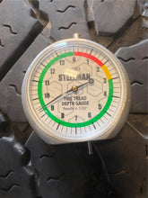 Load image into Gallery viewer, Set of Used '19-'25 RAM 1500 Black Rims 275/70R18 Goodyear Wrangler Duratrac LT