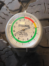 Load image into Gallery viewer, Set of Used '19-'25 RAM 1500 Black Rims 275/70R18 Goodyear Wrangler Duratrac LT