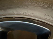 Load image into Gallery viewer, Set of 4 Used Black '19-'25 Dodge RAM 1500 OEM Wheels 275/55R20 Ironman Tires LT