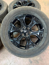 Load image into Gallery viewer, Set of Used '05-'25 Ford F150 Black Wheels on 275/60R20 Hankook Dynapro Tires LT