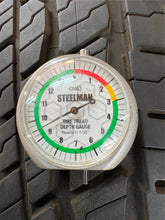 Load image into Gallery viewer, Set of Used '24-'25 Toyota Land Cruiser Dark Charcoal Rims 265/70R18 Michelin LT