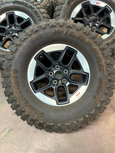 Load image into Gallery viewer, Set of 5 Used '07-'25 Jeep Wrangler Gladiator 17" Rims 35/12.50R17 Falken MT LT