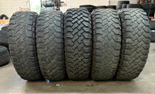 Load image into Gallery viewer, Set of 5 Used '07-'25 Jeep Wrangler Gladiator 17" Rims 35/12.50R17 Falken MT LT