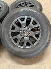 Load image into Gallery viewer, Set of OEM 17" '24-'25 Toyota Tacoma Dark Charcoal Wheels on 245/70R17 Tires LT