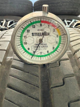 Load image into Gallery viewer, Set of OEM 17" '24-'25 Toyota Tacoma Dark Charcoal Wheels on 245/70R17 Tires LT