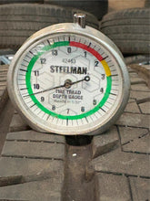 Load image into Gallery viewer, Set of 4 Used '19-'25 RAM 1500 Charcoal Machined Wheels 275/55R20 Bridgestone LT