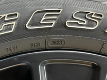Load image into Gallery viewer, Used Set of 4 OEM 20" Black '19-'25 RAM 1500 Rims on 275/55R20 Bridgestone HL LT