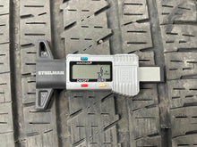 Load image into Gallery viewer, Used Set of 4 OEM 20" Black '19-'25 RAM 1500 Rims on 275/55R20 Bridgestone HL LT