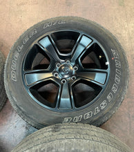Load image into Gallery viewer, Used Set of Four OEM 20" Black '19-'25 RAM 1500 Wheels 275/55R20 Bridgestone LT