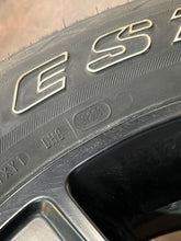Load image into Gallery viewer, Used Set of Four OEM 20" Black '19-'25 RAM 1500 Wheels 275/55R20 Bridgestone LT