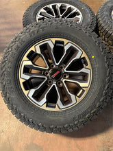 Load image into Gallery viewer, Set of '00-'25 Chevy Silverado 1500 Bronze Rims 275/65R18 Falken Rubitrek A/T01