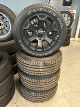 Load image into Gallery viewer, Set of Four OEM Black '19-'26 RAM 1500 Wheels 275/55R20 Bridgestone Alenza Tires