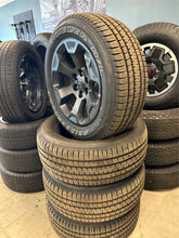 Load image into Gallery viewer, Set of Four OEM Black '19-'26 RAM 1500 Wheels 275/55R20 Bridgestone Alenza Tires