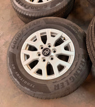 Load image into Gallery viewer, Set of Lightly Used '24-'26 Toyota Tacoma 17" OEM Rims 245/70R17 Goodyear HT LT