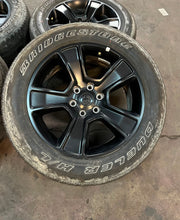 Load image into Gallery viewer, Set of 4 Used '19-'26 RAM 1500 Black OEM Wheels 275/55R20 Bridgestone H/L OWL LT