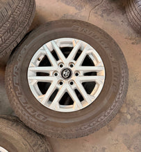 Load image into Gallery viewer, Set of Used '22-'26 Toyota Tundra 18" OEM 75281 Wheels 265/70R18 Bridgestone LT