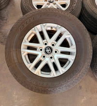 Load image into Gallery viewer, Set of Used '22-'26 Toyota Tundra 18" OEM 75281 Wheels 265/70R18 Bridgestone LT