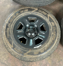 Load image into Gallery viewer, Set of Four Used 17" Black Steel Jeep Wrangler Gladiator Rims 245/75R17 Tires LT