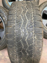 Load image into Gallery viewer, Set of Used 20" '19-'25 Dodge RAM 1500 Rims on 275/55R20 Falken Wildpeak AT LT