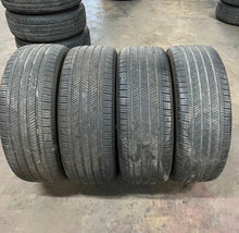 Load image into Gallery viewer, Set of 4 Used Matte Black 22" '19-'26 RAM 1500 Wheels 2727 on 285/45R22 Tires LT
