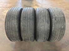 Load image into Gallery viewer, Set of Used 20" Black OEM '22-'26 Toyota Tundra Rims on 265/60R20 Bridgestone LT