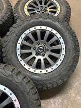 Load image into Gallery viewer, Set of 5 Used '22-'26 INEOS Grenadier 18" Rims on 255/70R18 BFGoodrich TAKO2 LT