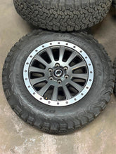 Load image into Gallery viewer, Set of 5 Used '22-'26 INEOS Grenadier 18" Rims on 255/70R18 BFGoodrich TAKO2 LT