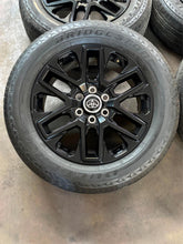 Load image into Gallery viewer, Set of Used 20" Black OEM '22-'26 Toyota Tundra Rims on 265/60R20 Bridgestone LT