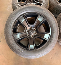 Load image into Gallery viewer, Set of Used 20" Black '19-'26 RAM 1500 2676 Wheels 275/55R20 Bridgestone H/L LT