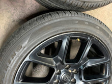 Load image into Gallery viewer, Set of 4 Used Matte Black 22" '19-'26 RAM 1500 Wheels 2727 on 285/45R22 Tires LT
