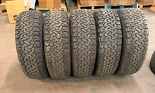 Load image into Gallery viewer, Set of 5 Used 17" OEM Ford Bronco Raptor Black Rims 37/12.50R17 BFGoodrich AT LT