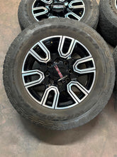 Load image into Gallery viewer, Set of 4 Used 5950 '11-'26 GMC Sierra 2500 3500 AT4 Rims 275/65R20 Goodyear E LT