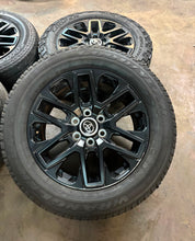 Load image into Gallery viewer, Set of Four Used '22-'26 Toyota Tundra Black OEM Wheels 95295 265/60R20 Tires LT