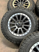Load image into Gallery viewer, Set of 5 Used '22-'26 INEOS Grenadier 18" Rims on 255/70R18 BFGoodrich TAKO2 LT