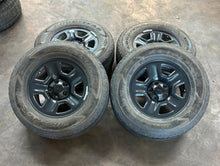 Load image into Gallery viewer, Set of Four Used 17" Black Steel Jeep Wrangler Gladiator Rims 245/75R17 Tires LT