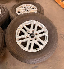Load image into Gallery viewer, Set of Used '22-'26 Toyota Tundra 18" OEM 75281 Wheels 265/70R18 Bridgestone LT