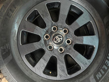 Load image into Gallery viewer, Set of Used OEM '18" '24-26 Toyota Land Cruiser Wheels 265/70R18 Michelin LTX LT