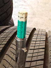 Load image into Gallery viewer, Lightly Used Set of '24-'26 Toyota Tacoma 17" OEM Rims 245/70R17 Goodyear HT LT